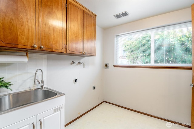 7215 N 23rd, Tacoma, WA 98406 - washroom featuring electric dryer hookup, cabinet space, and washer hookup
