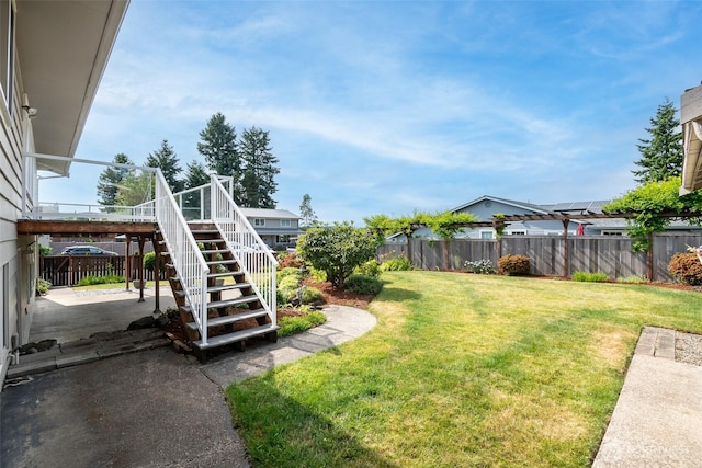 7215 N 23rd, Tacoma, WA 98406 - fenced backyard featuring stairs, a patio area, and a wooden deck
