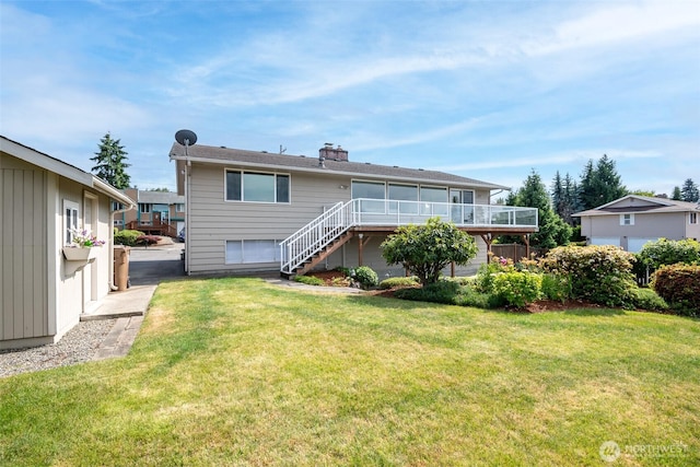 7215 N 23rd, Tacoma, WA 98406 - back of house featuring stairs, a chimney, a wooden deck, and a lawn