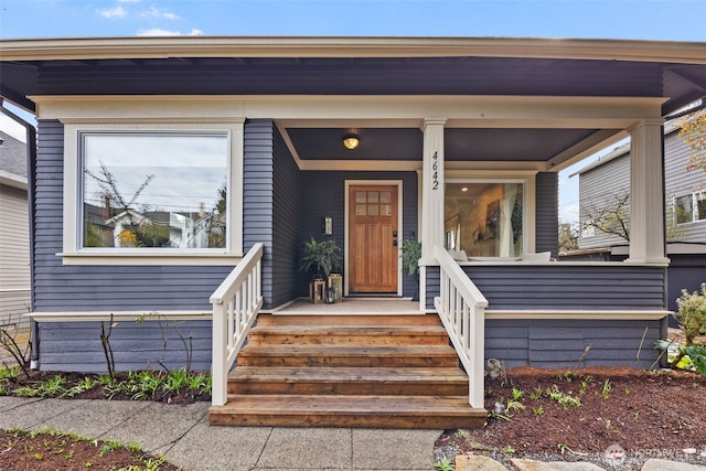 4642 Eastern Ave N, Seattle, WA 98103 - doorway to property with covered porch