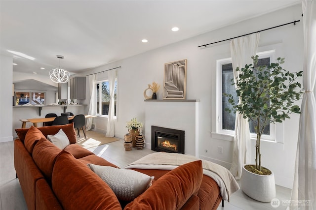 4642 Eastern Ave N, Seattle, WA 98103 - living room featuring recessed lighting and a glass covered fireplace