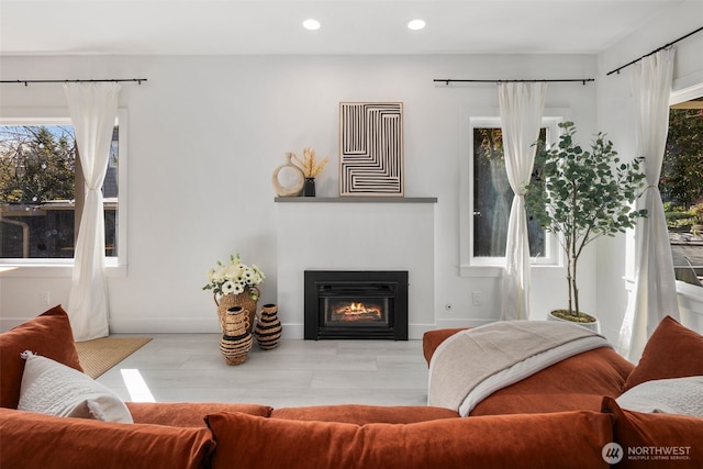 4642 Eastern Ave N, Seattle, WA 98103 - living area with recessed lighting and a glass covered fireplace