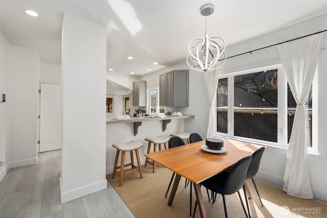 4642 Eastern Ave N, Seattle, WA 98103 - dining space featuring a chandelier, light wood finished floors, and recessed lighting