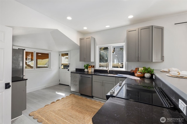 4642 Eastern Ave N, Seattle, WA 98103 - kitchen featuring stainless steel appliances, gray cabinets, and recessed lighting