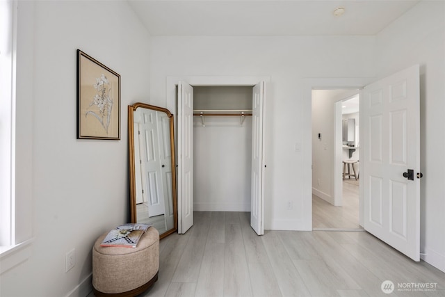 4642 Eastern Ave N, Seattle, WA 98103 - unfurnished bedroom featuring light wood-style flooring and a closet