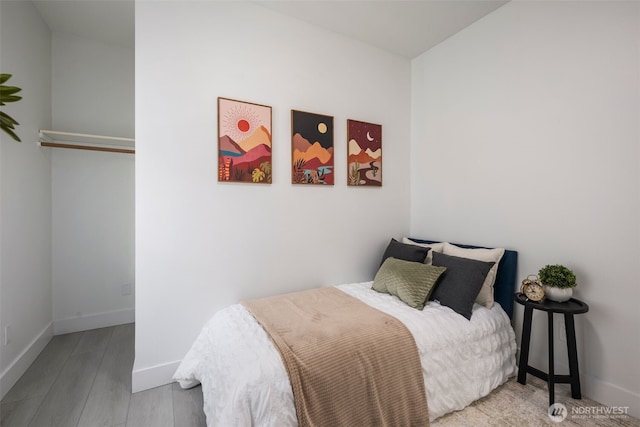 4642 Eastern Ave N, Seattle, WA 98103 - bedroom with wood finished floors and baseboards