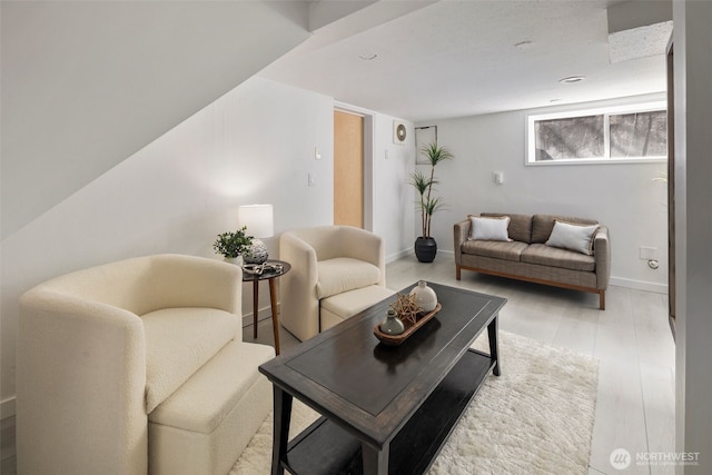 4642 Eastern Ave N, Seattle, WA 98103 - living area with baseboards and wood finished floors