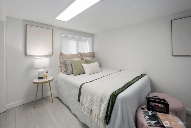 4642 Eastern Ave N, Seattle, WA 98103 - bedroom with light wood-type flooring and baseboards