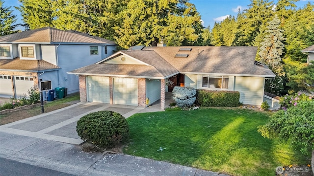 32232 7th Ave SW, Federal Way, WA 98023 - view of front of house with brick siding, a front lawn, a garage, concrete driveway, and roof with shingles