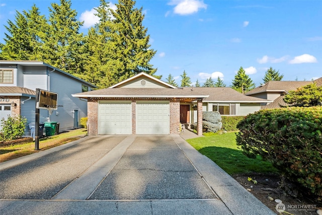 32232 7th Ave SW, Federal Way, WA 98023 - single story home featuring an attached garage, brick siding, driveway, and a front lawn