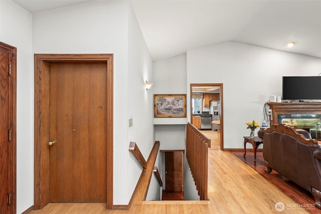 32232 7th Ave SW, Federal Way, WA 98023 - hall with wood finished floors, lofted ceiling, and an upstairs landing