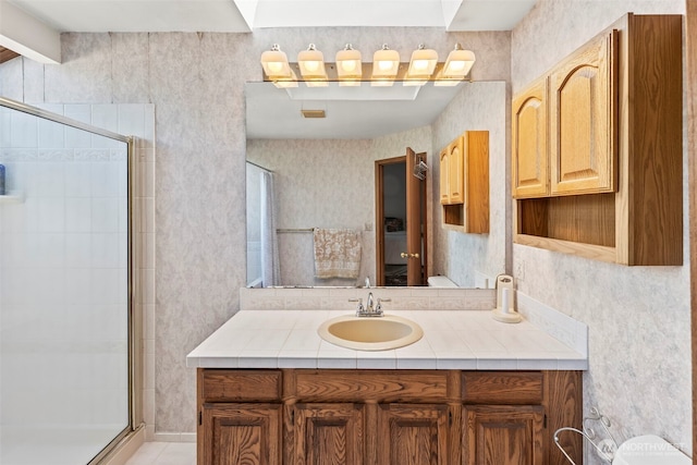 32232 7th Ave SW, Federal Way, WA 98023 - ensuite bathroom featuring a stall shower and vanity