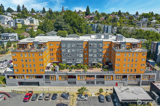 827 Hiawatha Pl S Unit 405, Seattle, WA 98144 - view of building exterior featuring uncovered parking