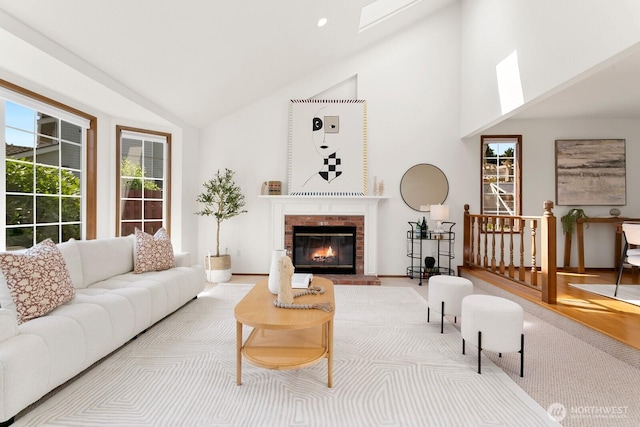 29617 58th Pl S, Auburn, WA 98001 - living room with vaulted ceiling, a fireplace, and baseboards