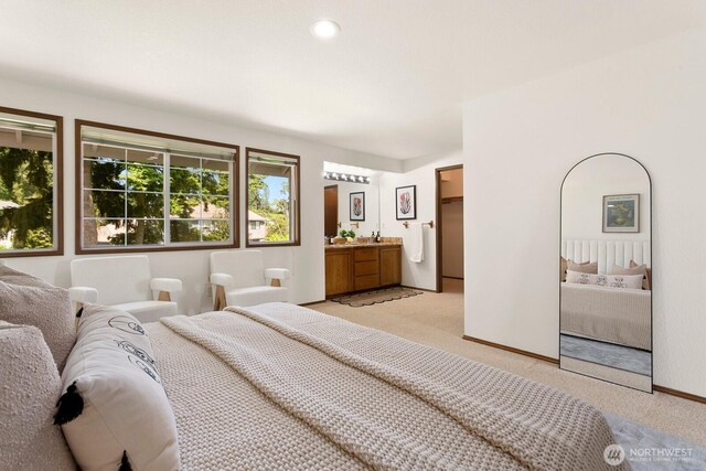 29617 58th Pl S, Auburn, WA 98001 - bedroom featuring light colored carpet, baseboards, and ensuite bathroom