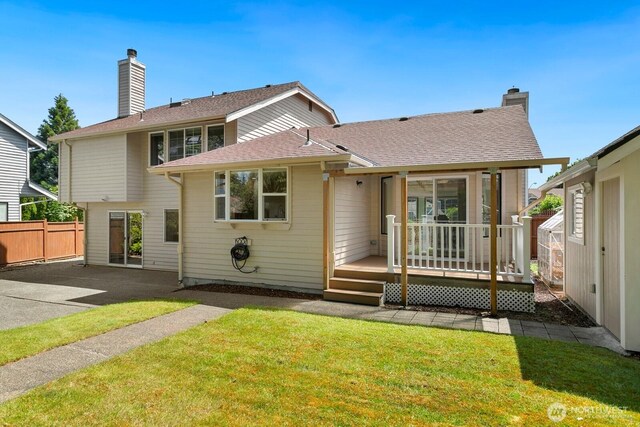 29617 58th Pl S, Auburn, WA 98001 - rear view of house featuring a chimney, a wooden deck, and a patio area