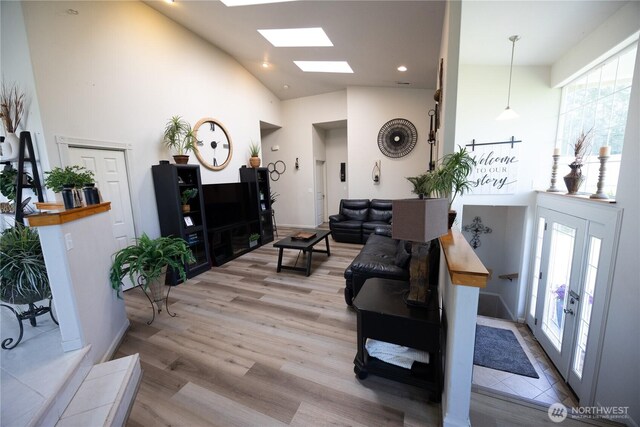 21266 Lafayette Rd, Sedro Woolley, WA 98284 - living area featuring high vaulted ceiling, healthy amount of natural light, light wood-style floors, recessed lighting, and a skylight