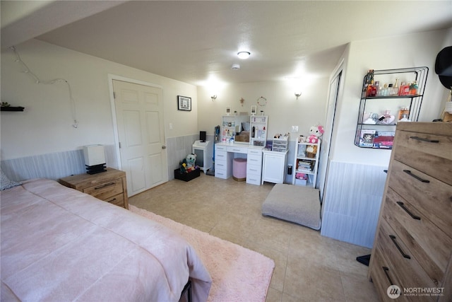 21266 Lafayette Rd, Sedro Woolley, WA 98284 - bedroom featuring light tile patterned flooring and a wainscoted wall