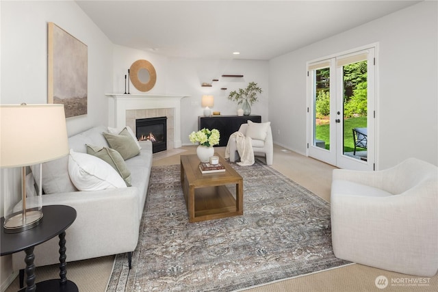 20108 NE 168th Pl, Woodinville, WA 98077 - carpeted living area featuring a tile fireplace and recessed lighting