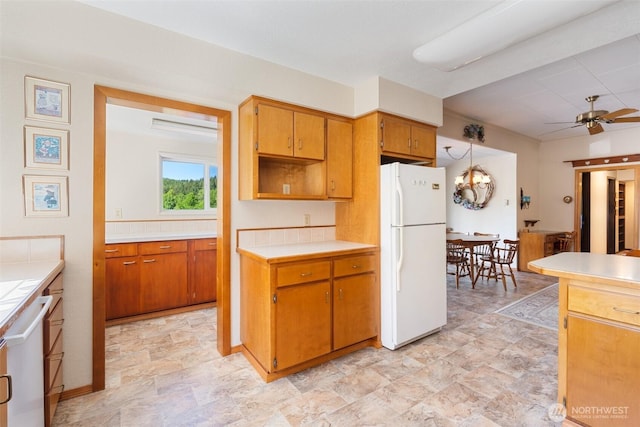 735 Coal Creek Rd, Chehalis, WA 98532 - kitchen with freestanding refrigerator, a ceiling fan, light countertops, and brown cabinets