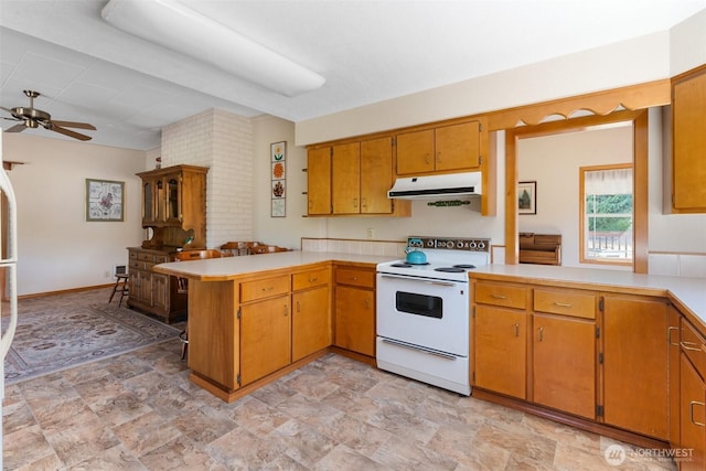 735 Coal Creek Rd, Chehalis, WA 98532 - kitchen with electric stove, extractor fan, a peninsula, ceiling fan, and light countertops