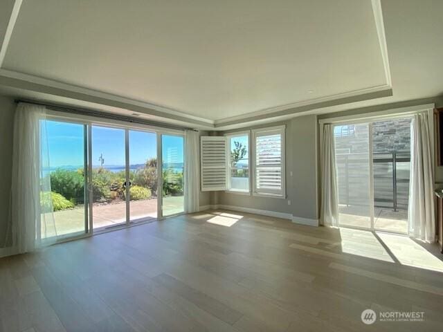 5105 Grand Loop Unit 107, Tacoma, WA 98407 - spare room with light wood-type flooring and baseboards
