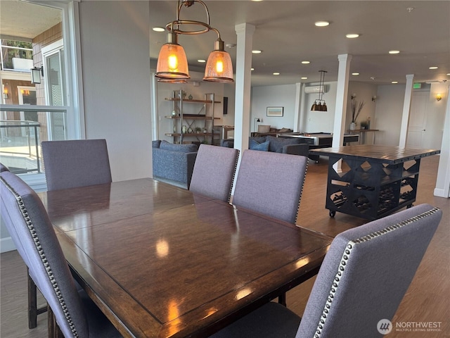 5105 Grand Loop Unit 107, Tacoma, WA 98407 - dining space featuring decorative columns, wood finished floors, and recessed lighting