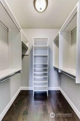 5105 Grand Loop Unit 107, Tacoma, WA 98407 - spacious closet with dark wood-style flooring
