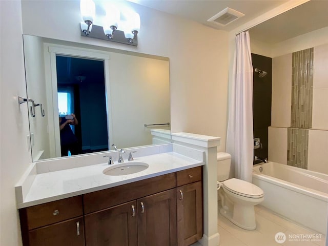 5105 Grand Loop Unit 107, Tacoma, WA 98407 - bathroom with vanity, toilet, shower / bath combo, and tile patterned floors