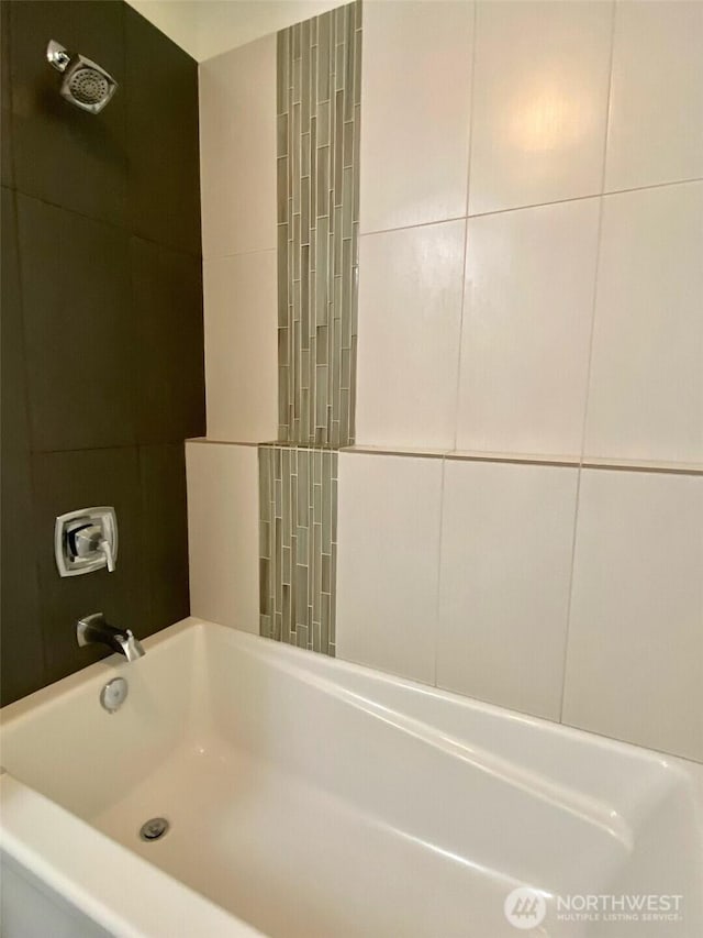 5105 Grand Loop Unit 107, Tacoma, WA 98407 - bathroom featuring washtub / shower combination