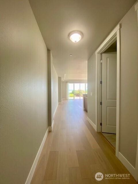 5105 Grand Loop Unit 107, Tacoma, WA 98407 - hall featuring baseboards and light wood-type flooring
