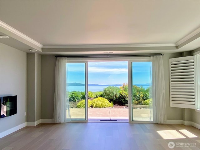 5105 Grand Loop Unit 107, Tacoma, WA 98407 - doorway to outside with crown molding and wood finished floors