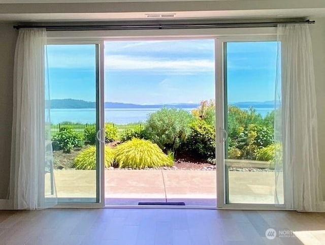 5105 Grand Loop Unit 107, Tacoma, WA 98407 - entryway with a water view