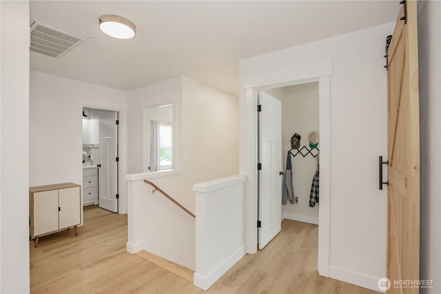 1860 Hoffman Hill Blvd, Dupont, WA 98327 - hall with an upstairs landing, light wood-type flooring, and baseboards