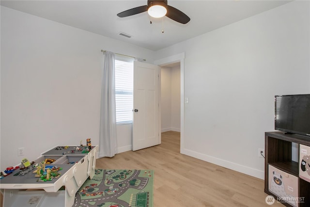1860 Hoffman Hill Blvd, Dupont, WA 98327 - game room featuring ceiling fan, light wood-style floors, and baseboards