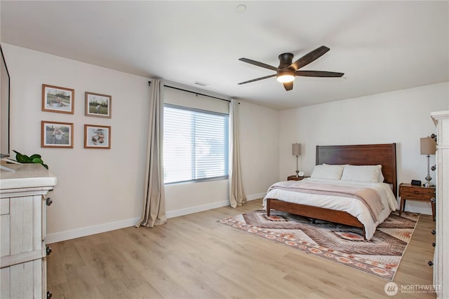 1860 Hoffman Hill Blvd, Dupont, WA 98327 - bedroom with light wood-style flooring, baseboards, and a ceiling fan