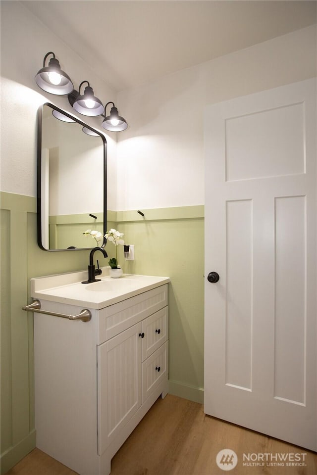 1860 Hoffman Hill Blvd, Dupont, WA 98327 - bathroom featuring vanity and wood finished floors