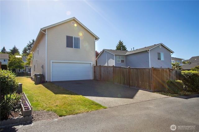1860 Hoffman Hill Blvd, Dupont, WA 98327 - view of front of home with an attached garage and asphalt driveway