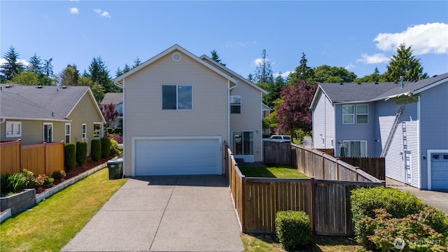 1860 Hoffman Hill Blvd, Dupont, WA 98327 - traditional-style home featuring an attached garage and driveway
