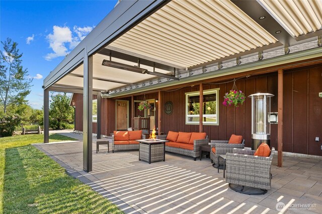 2853 Game Farm Rd, Ellensburg, WA 98926 - view of patio / terrace with an outdoor living space with a fire pit