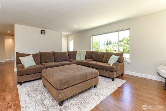 181 Coal Ave, Carbonado, WA 98323 - living area featuring baseboards, wood finished floors, and recessed lighting