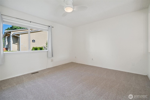 10030 NE 120th St Unit J2, Kirkland, WA 98034 - unfurnished room with carpet flooring, ceiling fan, and baseboards