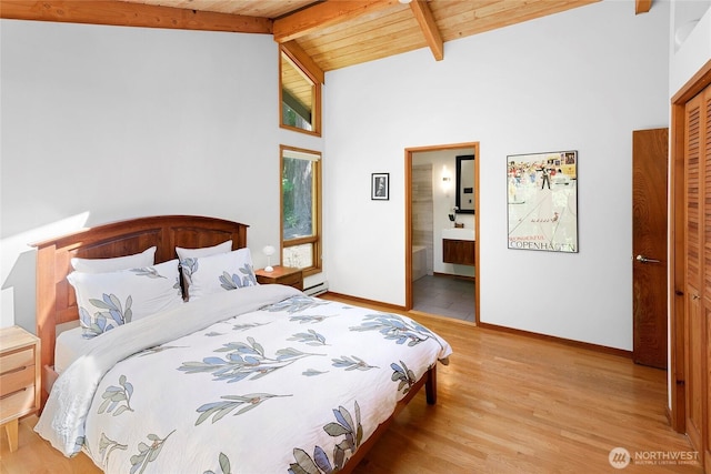 9767 Battle Point Dr NE, Bainbridge Island, WA 98110 - bedroom featuring light wood-style flooring, a wooden ceiling with exposed beams, high vaulted ceiling, and ensuite bathroom