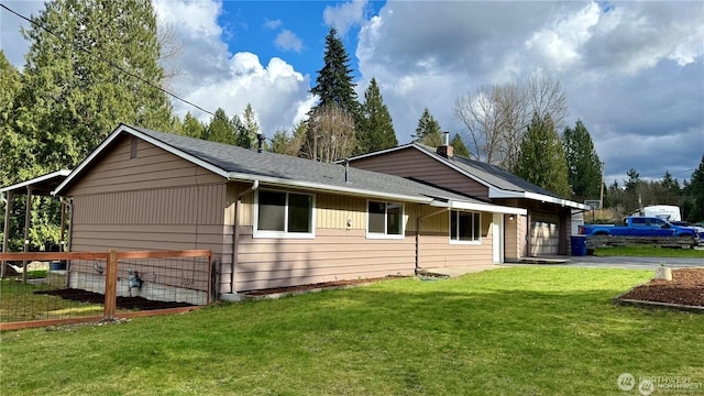 13676 197th Ave SE, Renton, WA 98059 - view of property exterior with an attached garage and driveway