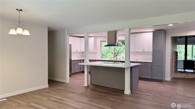 13676 197th Ave SE, Renton, WA 98059 - kitchen featuring gray cabinets, light countertops, backsplash, and recessed lighting