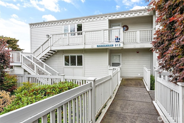 912 11th Unit 101, Bellingham, WA 98225 - rear view of property featuring stairway and a balcony
