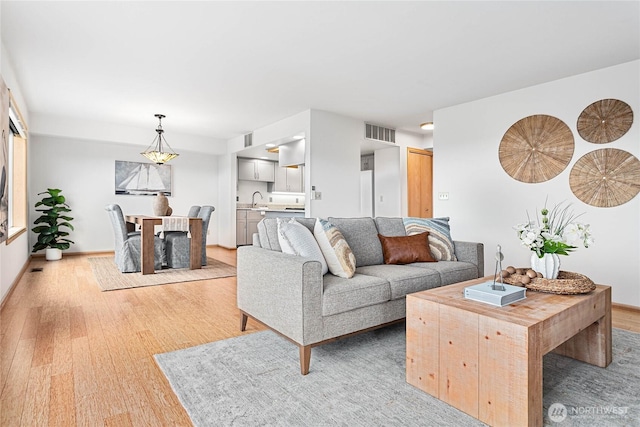 912 11th Unit 101, Bellingham, WA 98225 - living area featuring light wood-style floors and baseboards