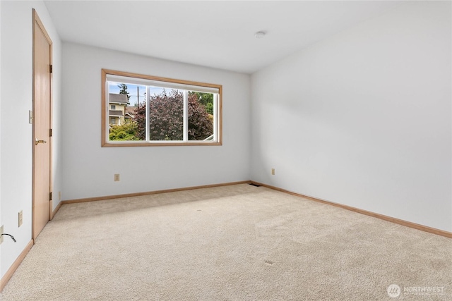 912 11th Unit 101, Bellingham, WA 98225 - unfurnished room featuring carpet and baseboards