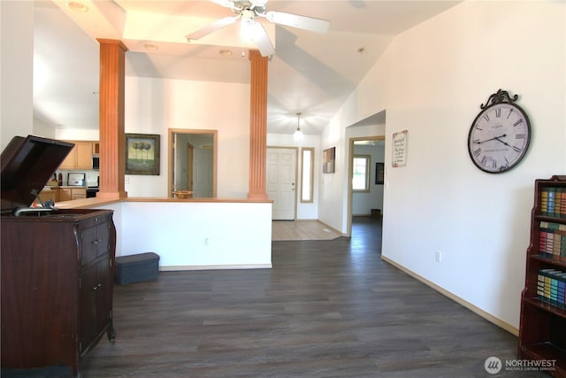 8422 NE 176th St, Arlington, WA 98223 - living room featuring ornate columns, dark wood finished floors, ceiling fan, high vaulted ceiling, and baseboards