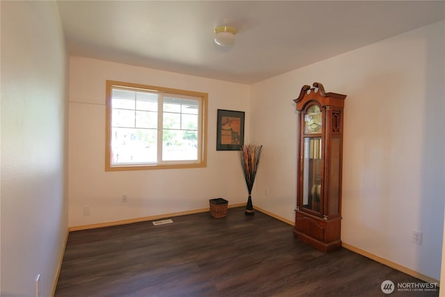 8422 NE 176th St, Arlington, WA 98223 - spare room with dark wood-type flooring and baseboards
